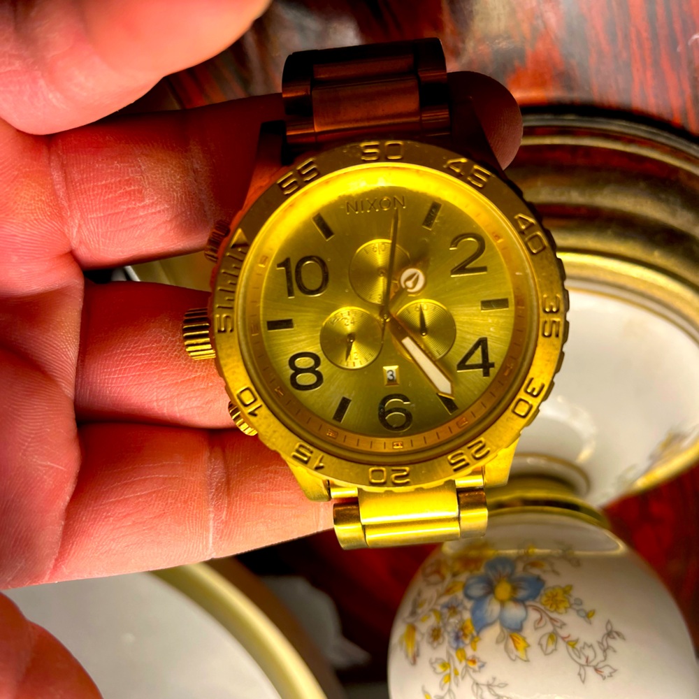 NIXON GOLD MENS WATCH